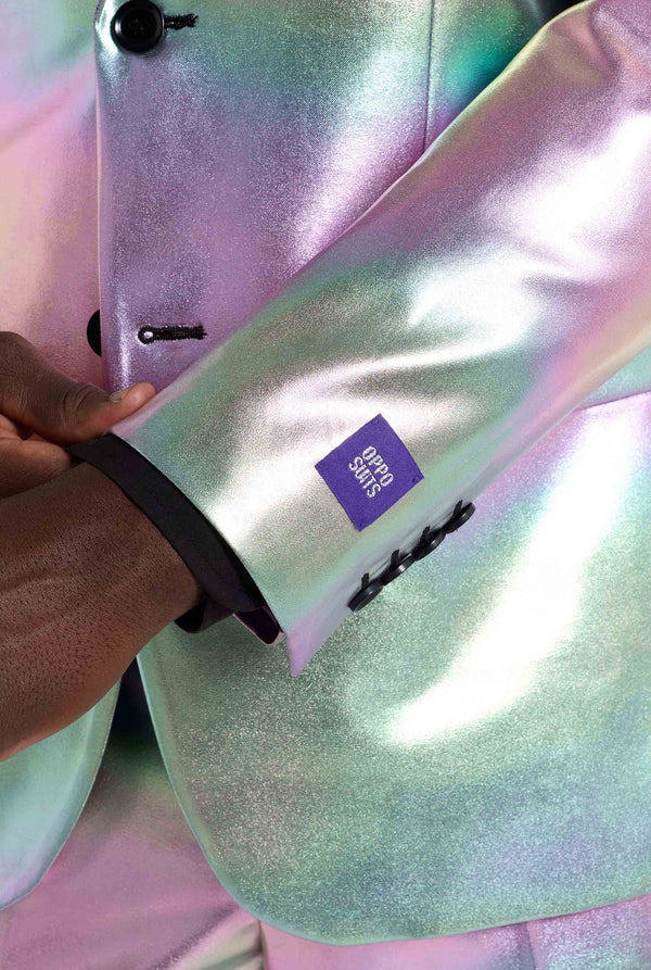 Iridescent sleeve with a visible brand logo held by a hand.