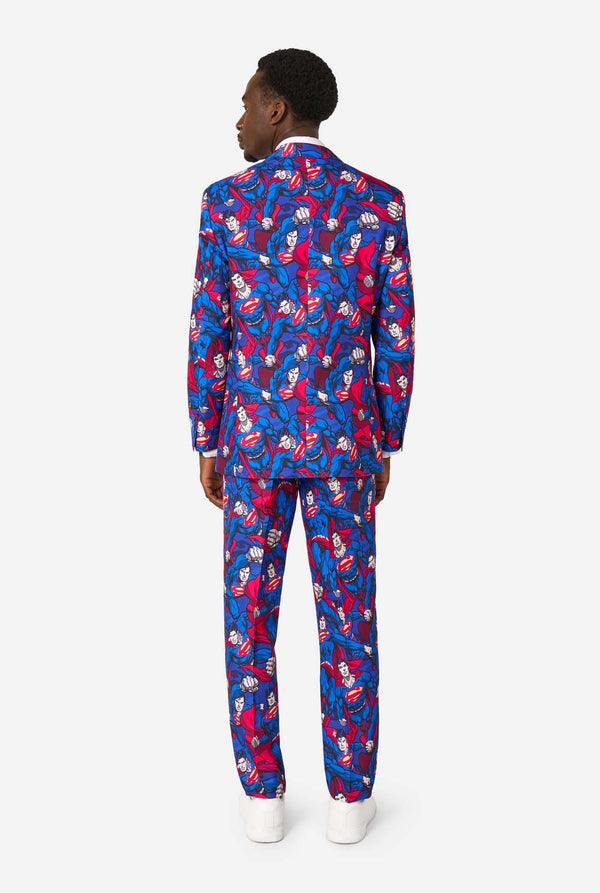 Person wearing a colorful suit with Superman character pattern on a white background