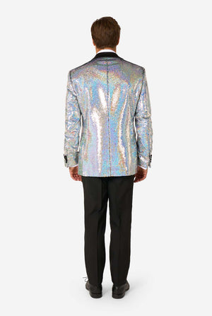 Man wearing a holographic sequin jacket and black pants on a white background