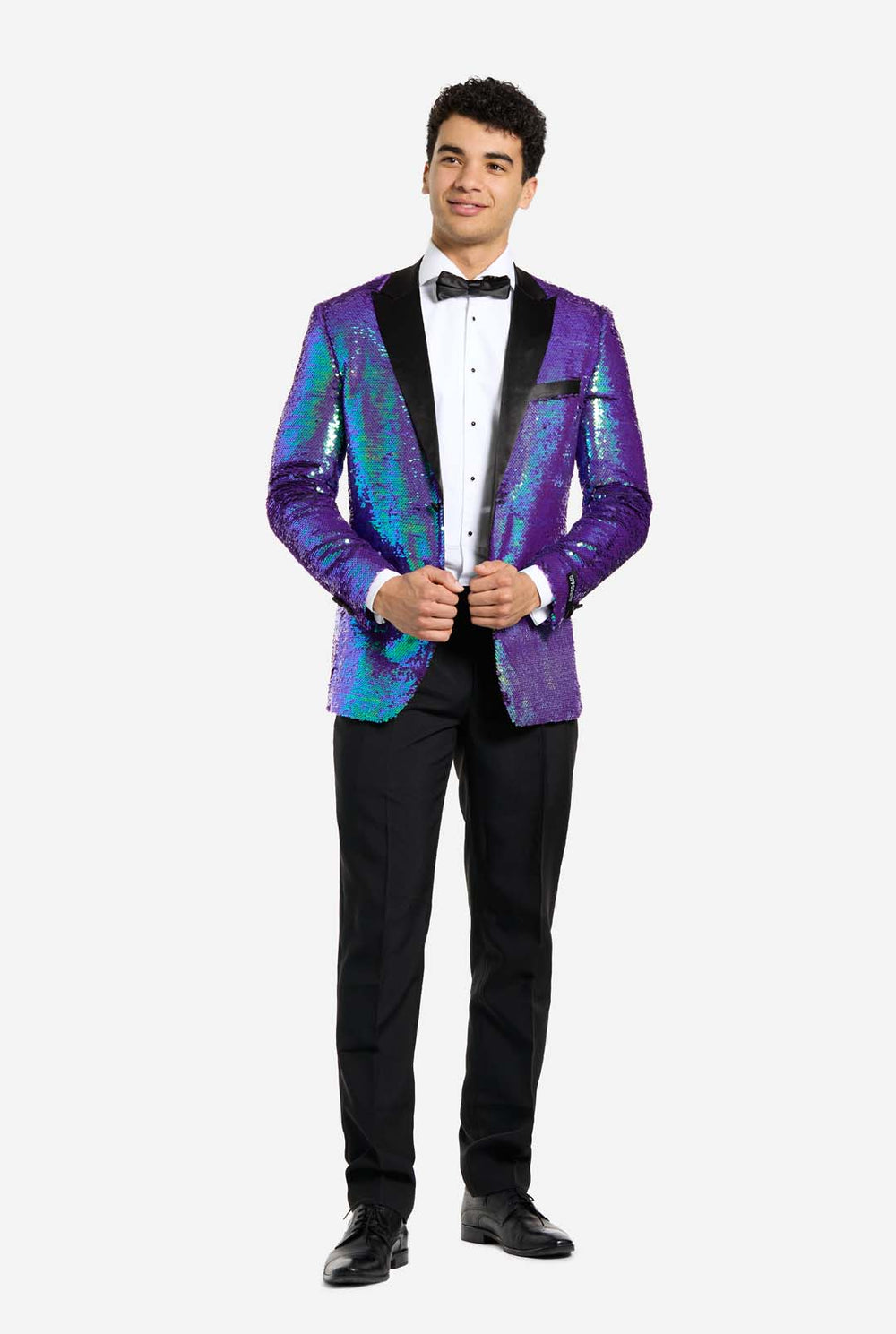 Man wearing a sapphire sequin tuxedo jacket with a close-up of the sequins on a white background