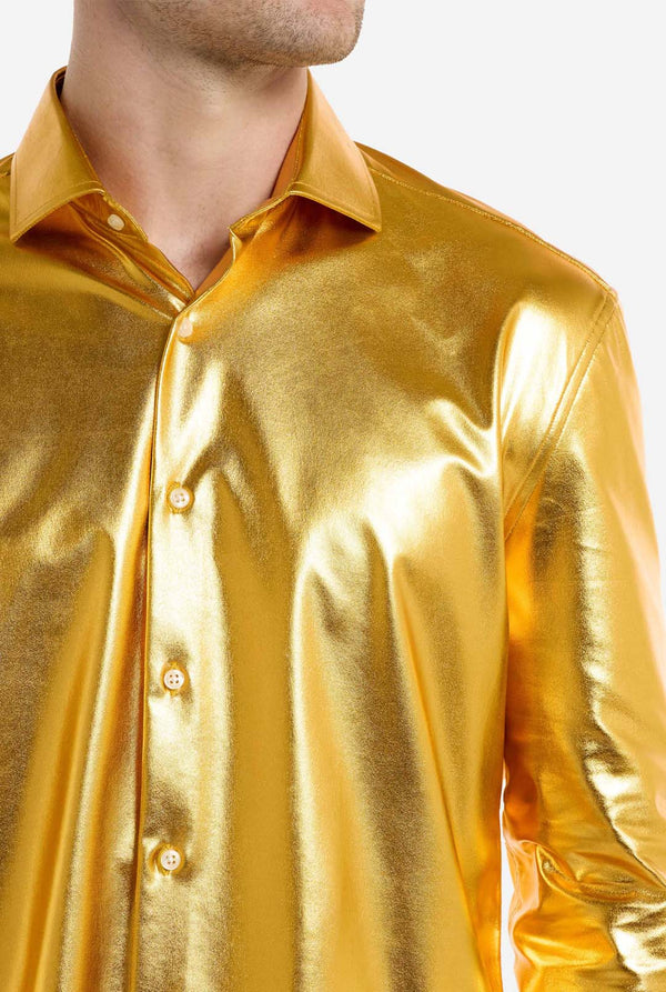 Shiny gold shirt worn by a person on a white background