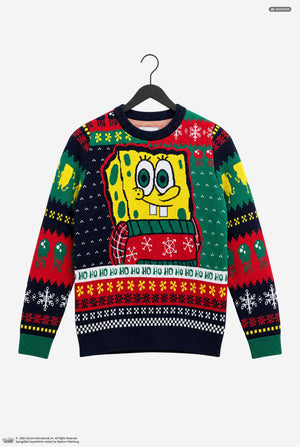 A SpongeBob-themed Christmas sweater hanging on a black hanger against a light gray background. The sweater features a large yellow SpongeBob character on the front wearing a red patterned scarf, surrounded by festive green, red, and navy holiday patterns, snowflakes, and 'HO HO HO' text.