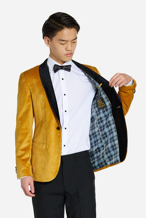 Teen wearing golden velvet dinner jacket