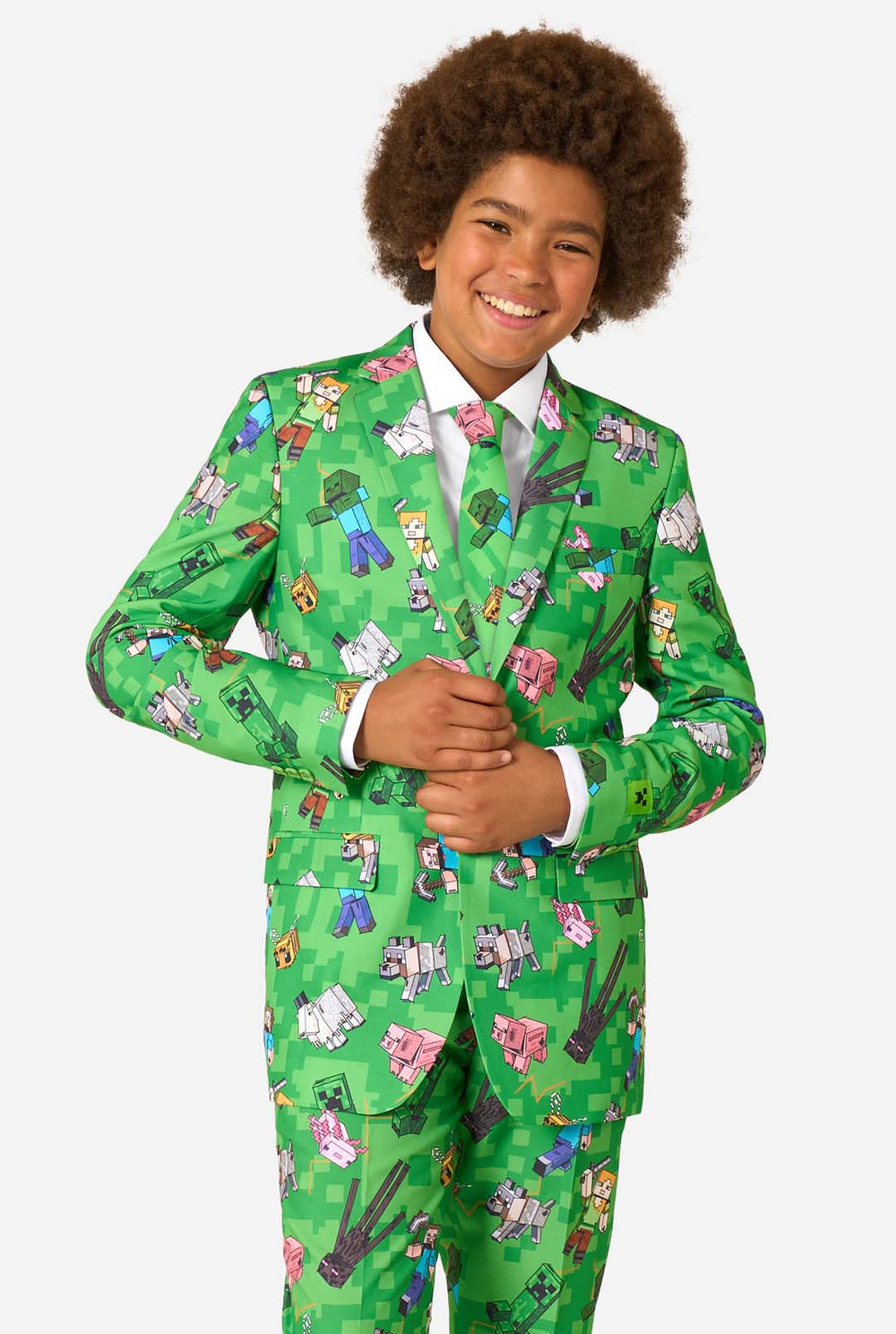 Person wearing a green patterned Minecraft suit on a white background