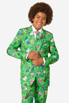 Person wearing a green patterned Minecraft suit on a white background