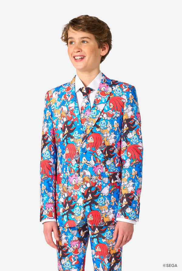 Person wearing a colorful Sonic-themed suit on a white background