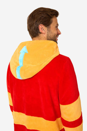 Man wearing a red and yellow onesie with a blue design on a white background