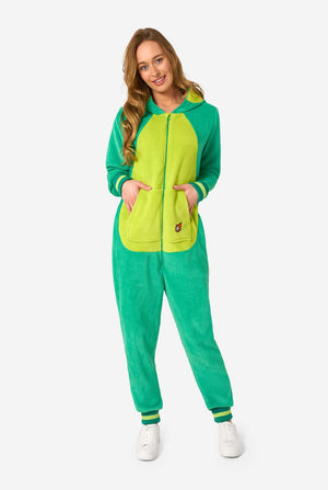 Woman wearing a green and yellow onesie on a white background. Full body image