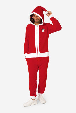 Person wearing a red onesie with a hood on a white background