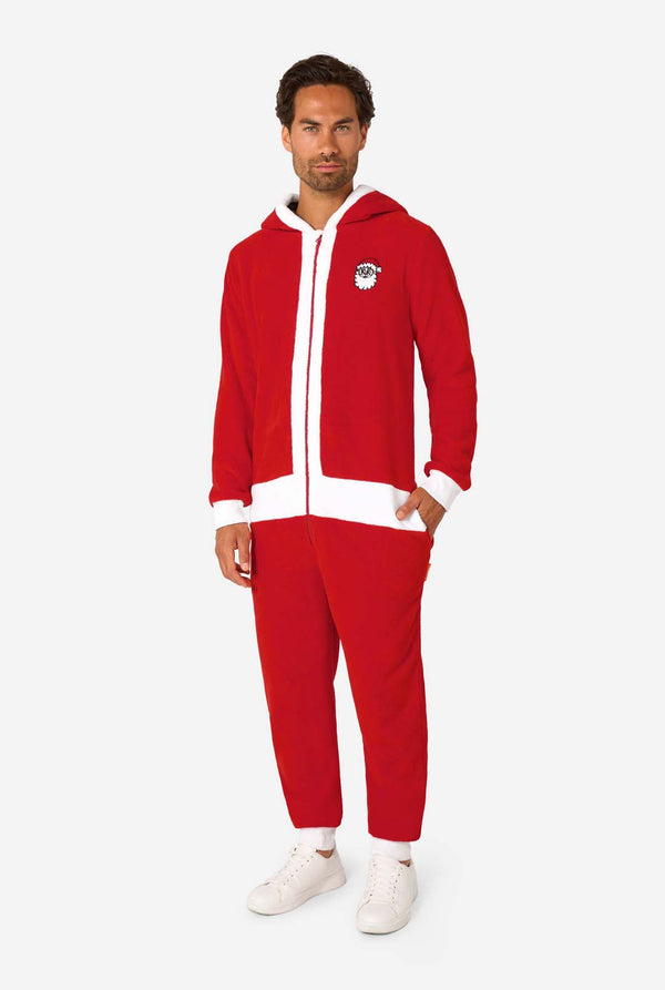 Man wearing a red onesie with a white logo on a white background