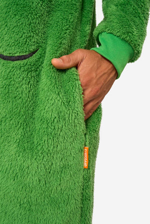 Green fleece onesie with a hand on the chest pocket against a white background