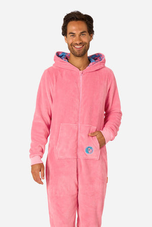 Man wearing a pink My Little Pony onesie with a hood on a white background