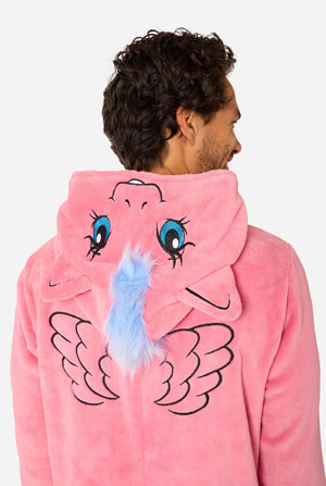 Person wearing a pink My Little Pony onesie with cartoon face design on a light gray background