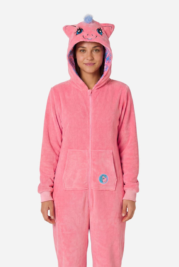 Person wearing a pink My Little Pony onesie with a hood on a white background