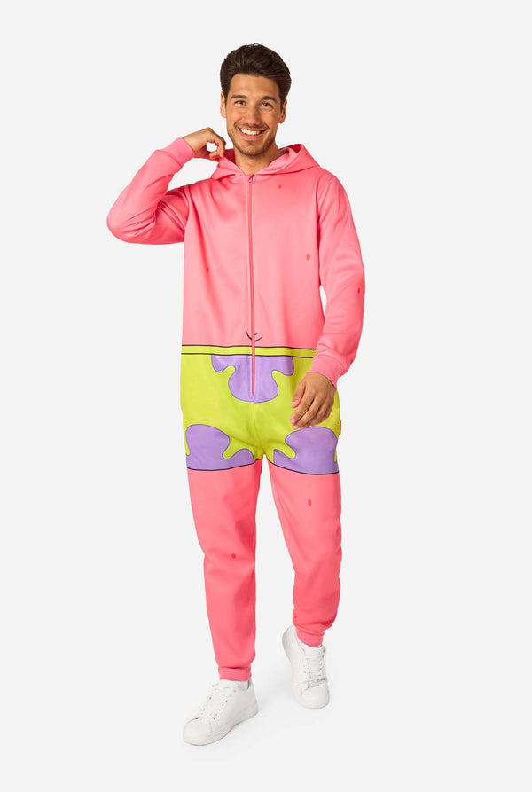 Person wearing a colorful pink and green onesie on a white background. Full body image