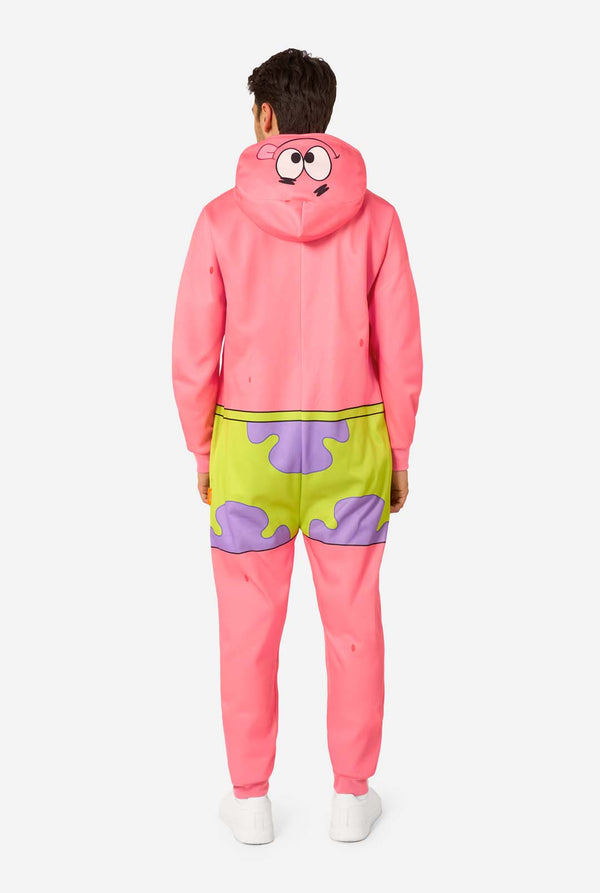 Person wearing a colorful pink and green onesie with cartoon face design on a white background. View from the back