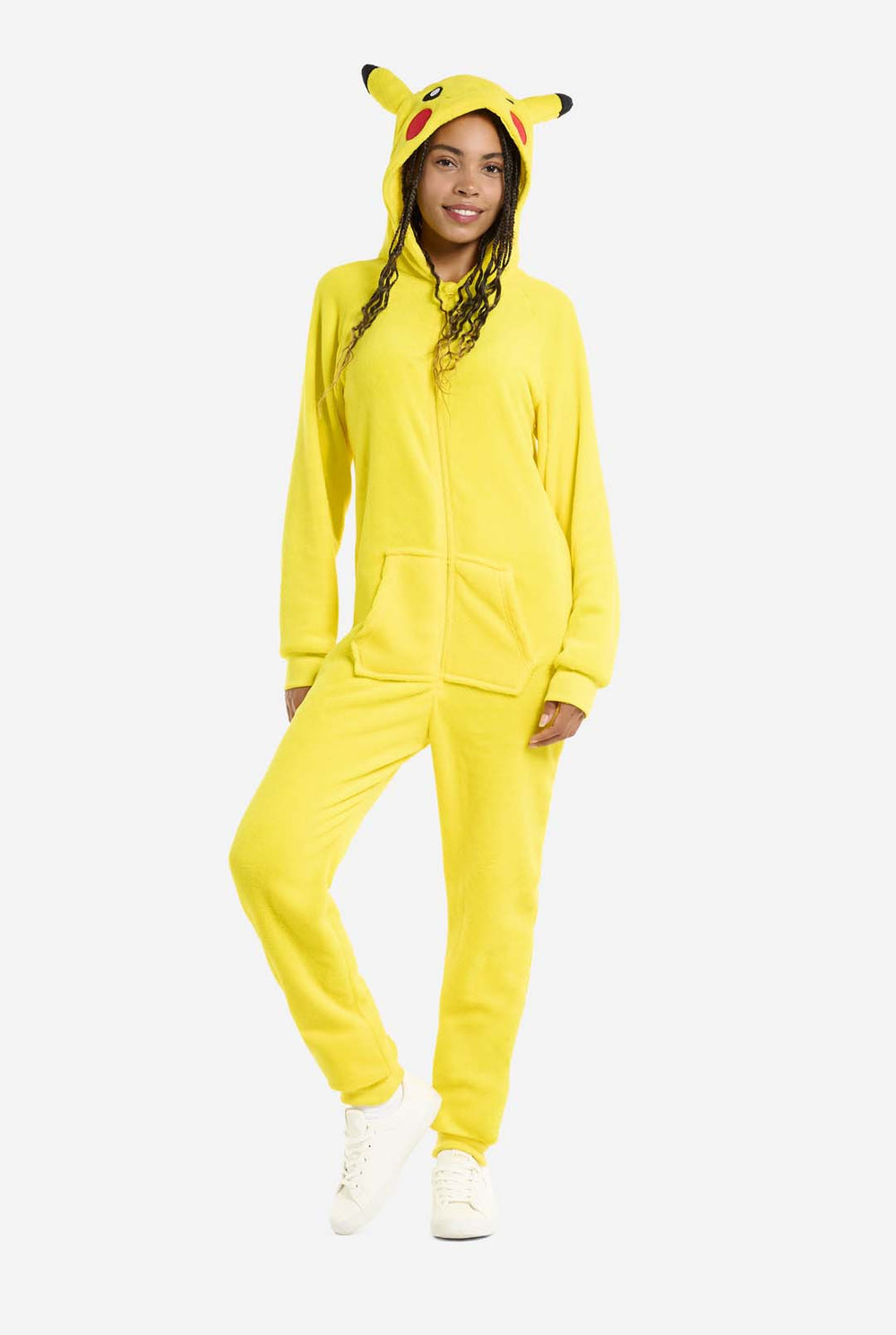 A man is wearing a vibrant Pikachu onesie, designed to resemble the iconic Pokémon character. This unisex adult onesie is bright yellow with Pikachu’s recognizable face on the hood, featuring large black-tipped ears, black eyes, red cheeks, and a cute smile. The onesie has a convenient front zipper closure and two front pockets for functionality and comfort. The soft, cozy material makes it perfect for lounging, cosplay events, or Pokémon-themed gatherings. Ideal for Pokémon fans.