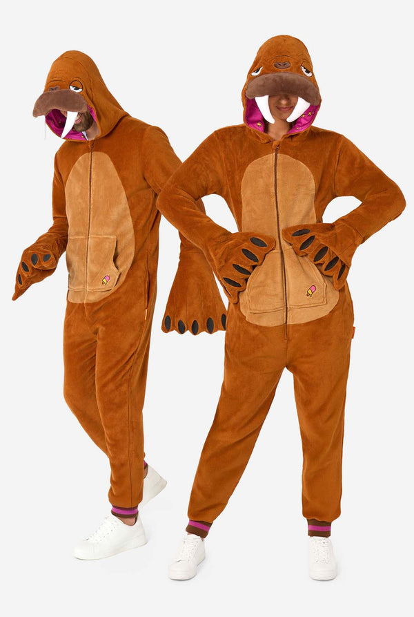 Two people wearing brown walrus-themed onesies on a white background. Full body image