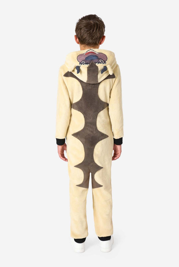 Child wearing a onesie with a pattern on a white background