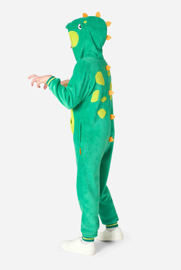 Green dinosaur onesie worn by a person on a white background
