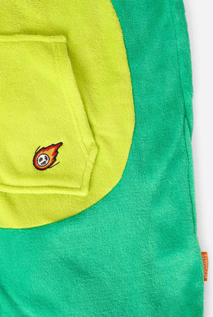 Close-up of a green and yellow dinosaur onesie with a small embroidered design on a white background
