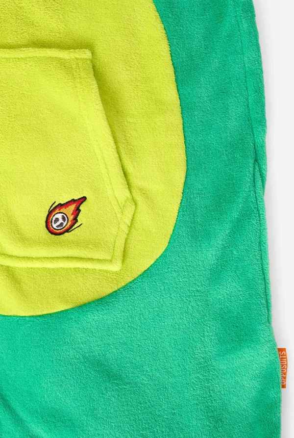 Close-up of a green and yellow dinosaur onesie with a small embroidered design on a white background