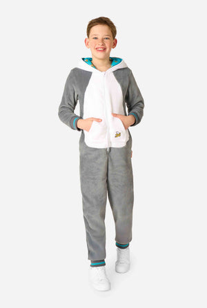 Child wearing a gray and white lemur onesie with a hood on a white background. Full body image