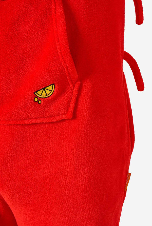 Red lobster onesie with a small yellow lemon design on a white background