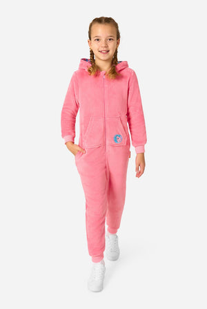 Child wearing a pink My Little Pony onesie with a logo on a white background. Full body image.