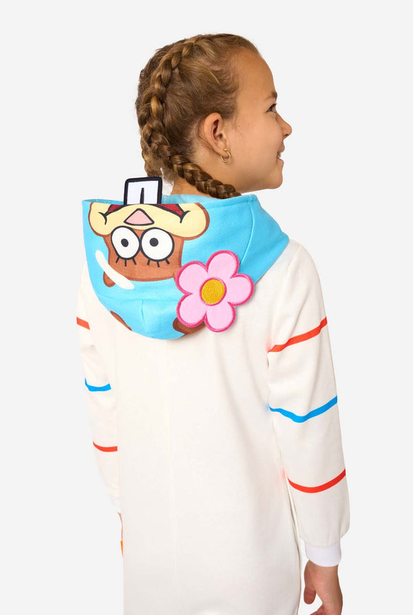Child wearing a colorful onesie with cartoon character and flower design on a white background