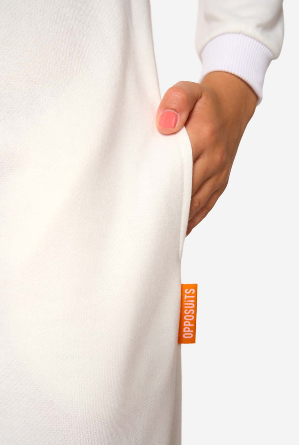 Close-up of a white onesie with an orange label on a white background