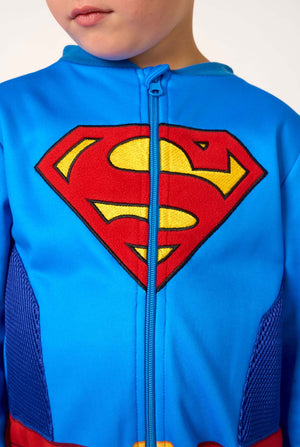 Blue superhero onesie with a prominent logo on a plain background