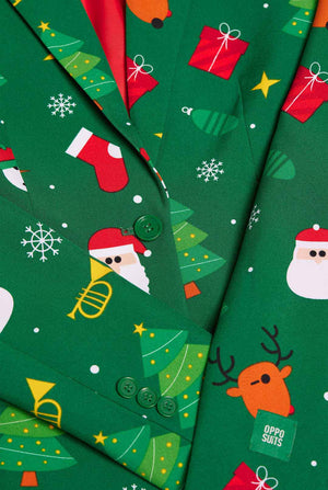 Woman wearing green Christmas blazer for women, with Christmas icons on it. Close up