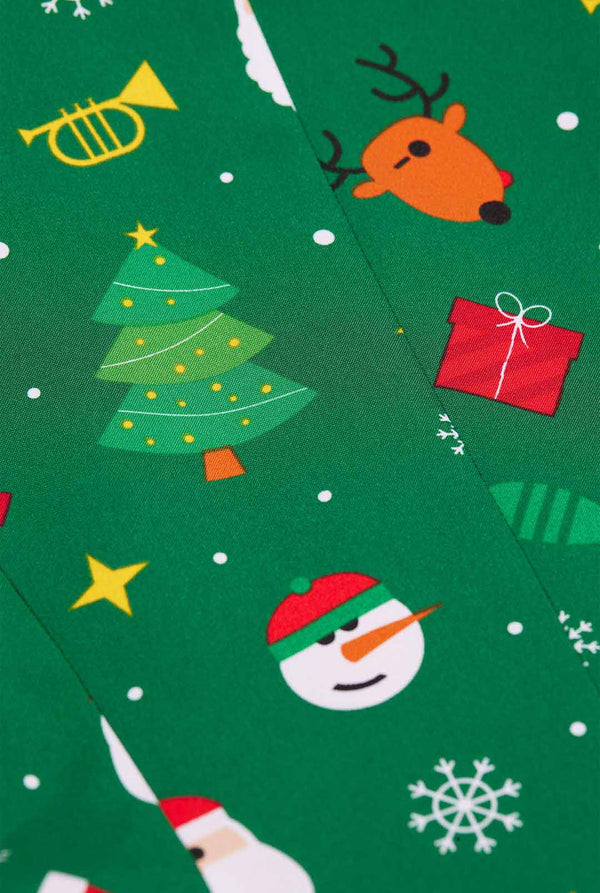 Woman wearing green Christmas blazer for women, with Christmas icons on it. Close up.