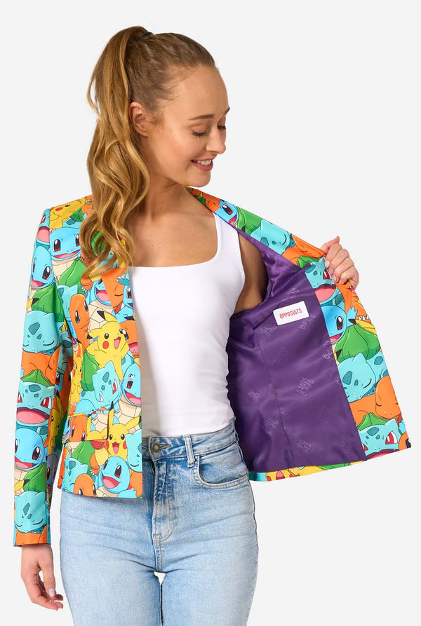 Person wearing a colorful jacket with Pokemon character patterns on a white background