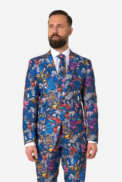 Man wearing a colorful suit with Transformers pattern on a white background