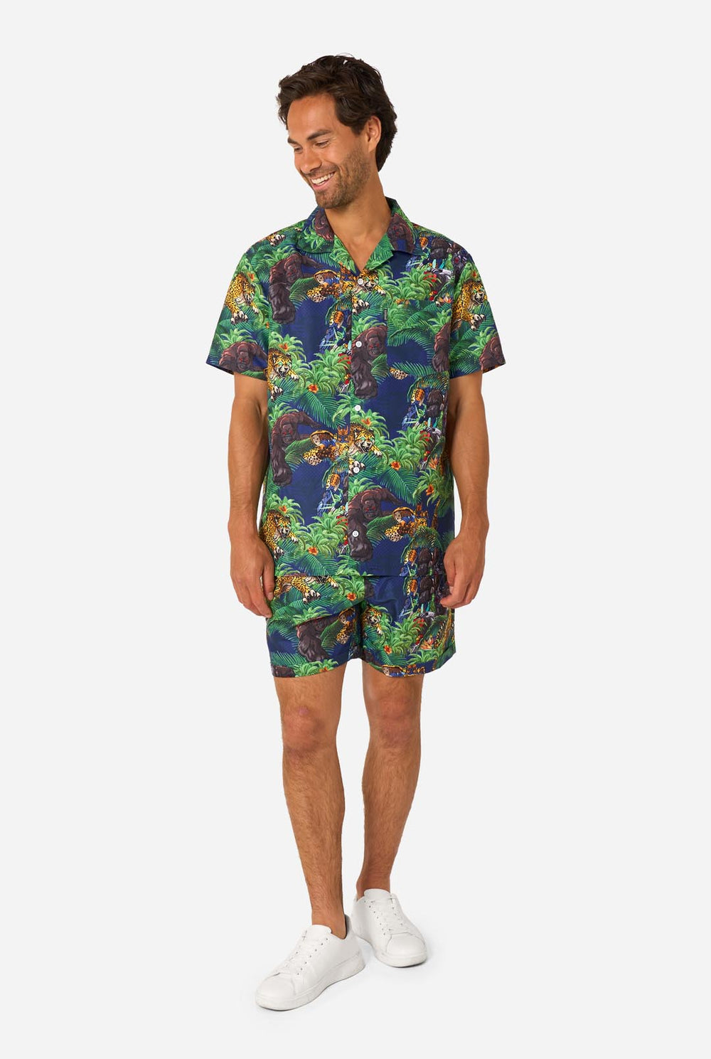 Man wearing a colorful tropical Transformers summer set on a white background