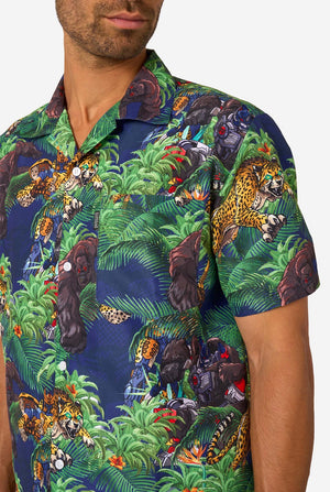 Man wearing a colorful shirt with Transformers pattern