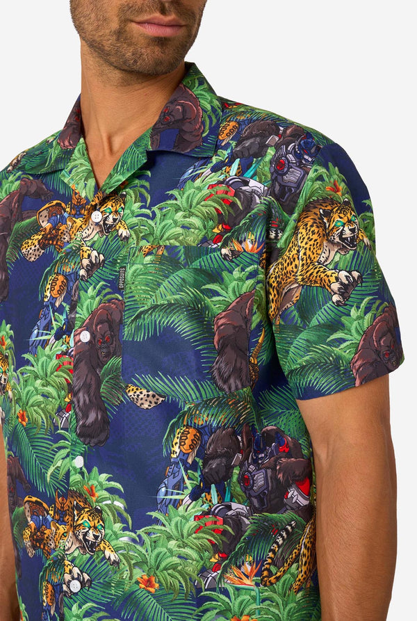 Man wearing a colorful shirt with Transformers pattern