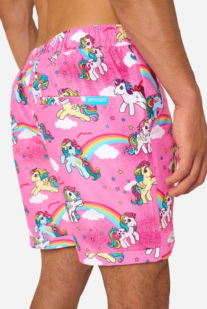Pink My Little Pony shorts with unicorn and rainbow pattern on a plain background