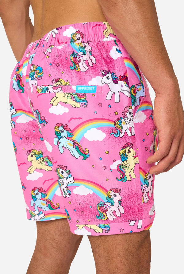 Pink My Little Pony shorts with unicorn and rainbow pattern on a plain background