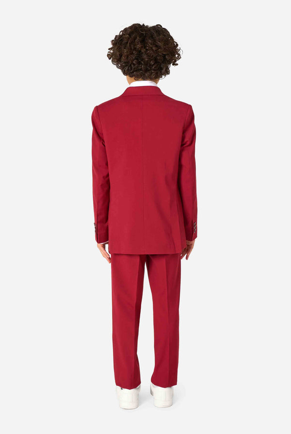 Person wearing a red suit on a white background. View from the back