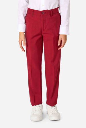 Red pants worn by a person on a white background