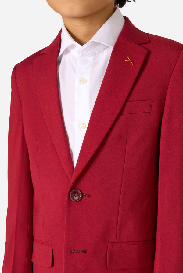 Red blazer worn by a person with a white shirt underneath, on a plain background