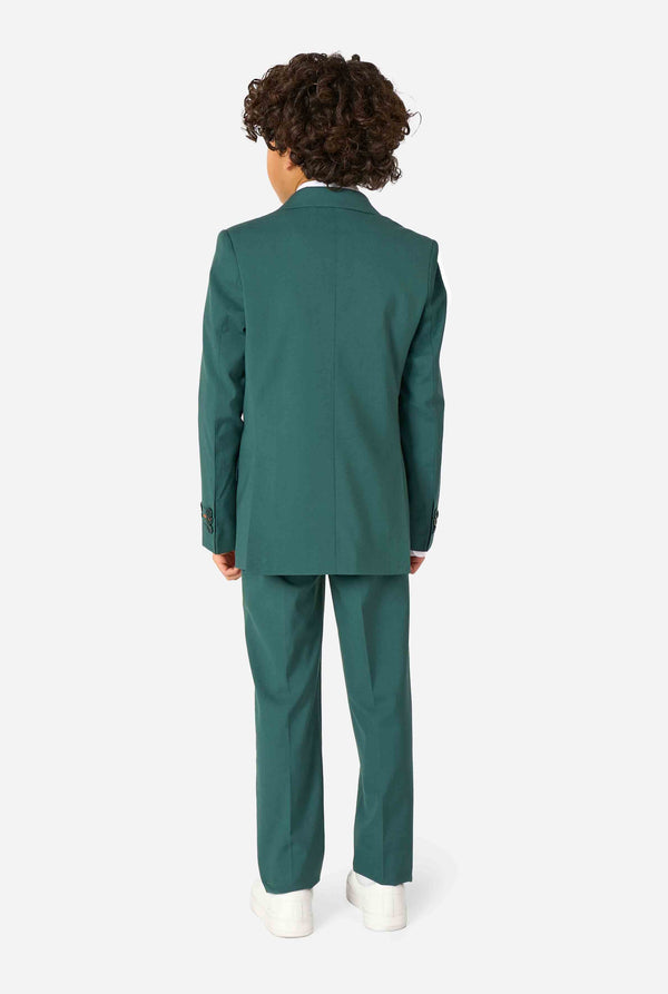 Person wearing a green suit standing against a white background. View from the back