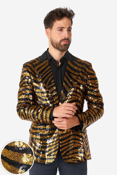 Man wearing a gold and black sequin jacket on a white background