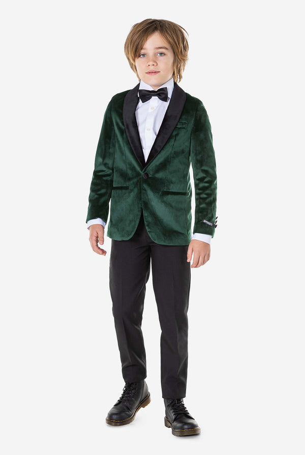 Boy wearing green velvet Christmas dinner jacket