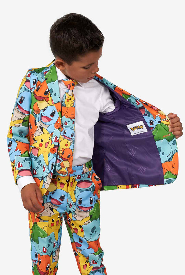 Boy wearing pokemon print suit