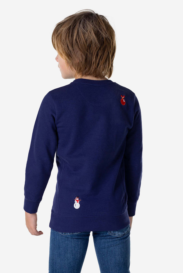 Back view of Kid wearing blue Christmas sweater with Christmas icons