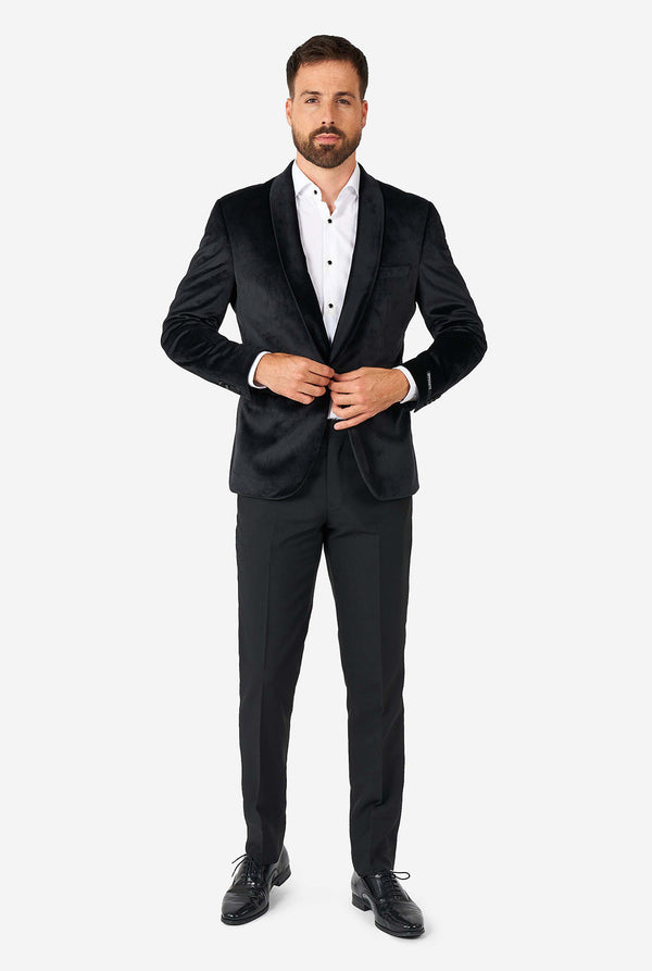 Man wearing black velvet dinner jacket blazer